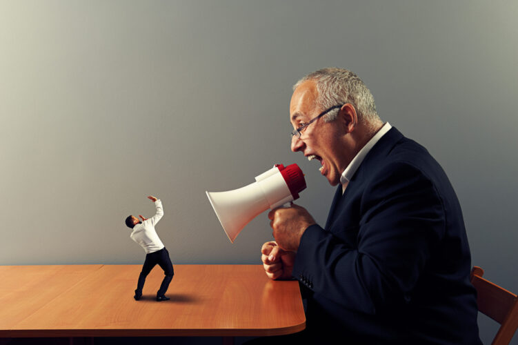 Boss confronting employee - workplace stress and dynamics